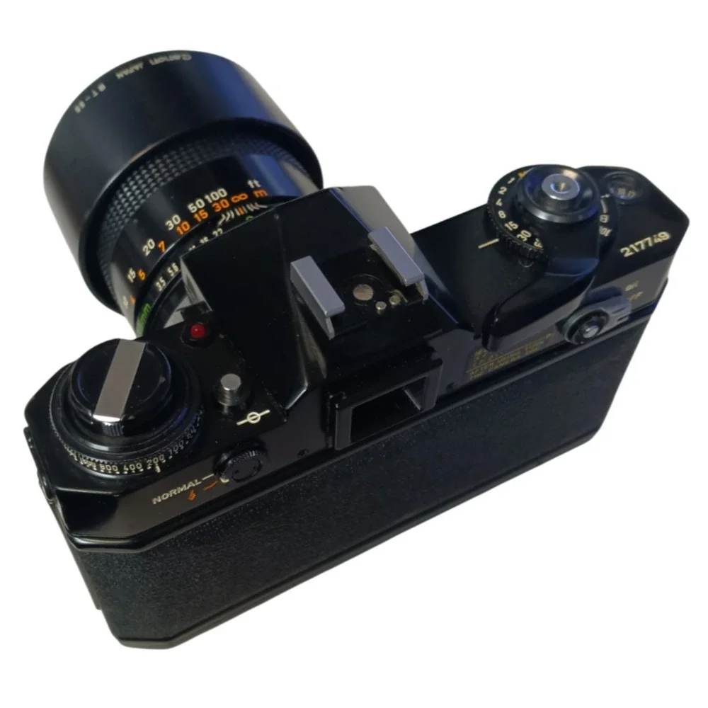 Vintage Canon EF SLR 35mm Film Camera with 135‎ mm Zoom Lens, Made in Japan